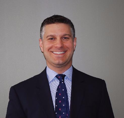 Image of Dr. Mark Brown, a doctor with a stethoscope, smiling